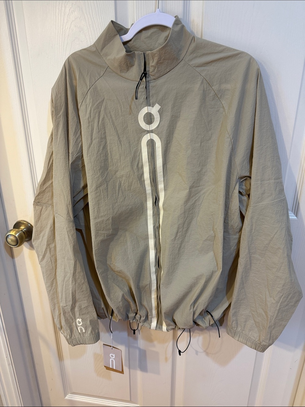 On Cloud Running Desert Track Jacket Ikon Sz L.  NWT